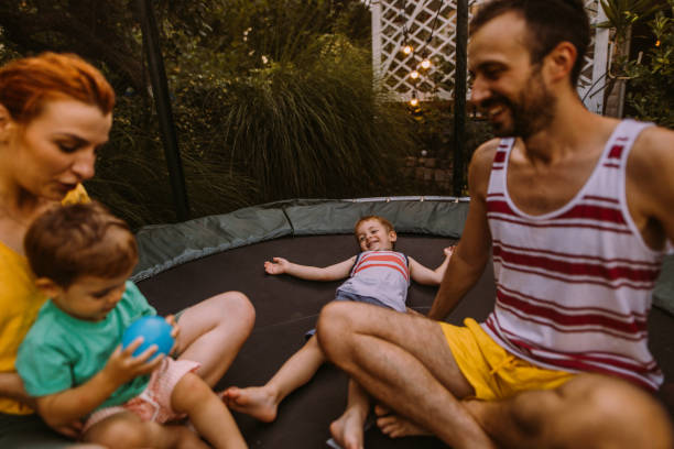 istock Family on a trampoline 1186594507