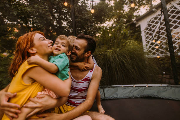 istock Family on a trampoline 1186594538