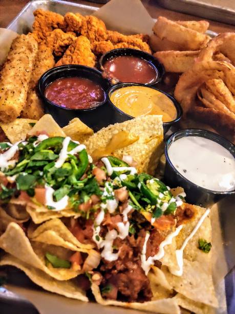 house sampler at buffalo wild wings - mozzarella stick appetizer fried imagens e fotografias de stock