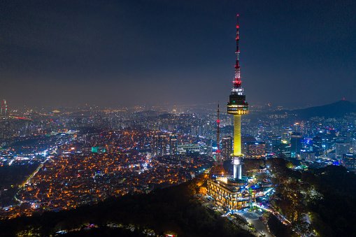 Aerial view of  N Seoul Tower at Namsan Mountain in Seoul City, South Korea at night