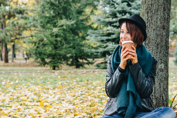 istock Woman taking a coffee break stock photo 1186604708