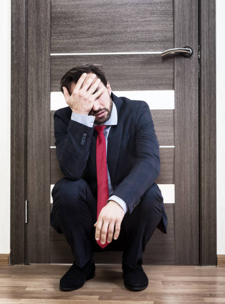 insecure man waiting for a job interview - overstrained imagens e fotografias de stock