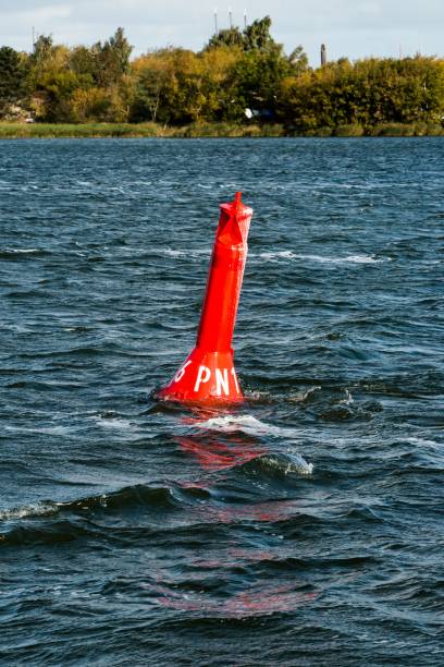 istock red buoy near the shore 1186612361