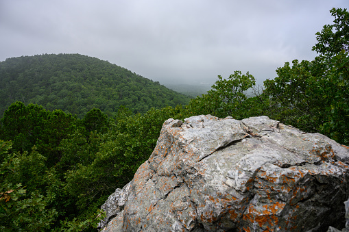 Giant Boulder Peeks Above Forest in Arkansas mountains