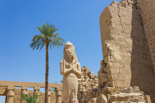 Luxor Temple, Egypt - March 19, 2023: The Luxor Temple is a large Ancient Egyptian temple complex located on the east bank of the Nile River in the city today known as Luxor (ancient Thebes) and was constructed approximately 1400 BCE. In the Egyptian language it was known as ipet resyt, \