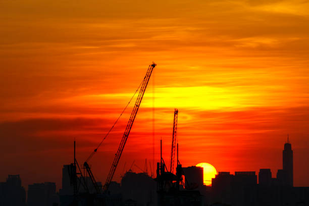 istock Sky in colors of fire with shadow construction 1186625398