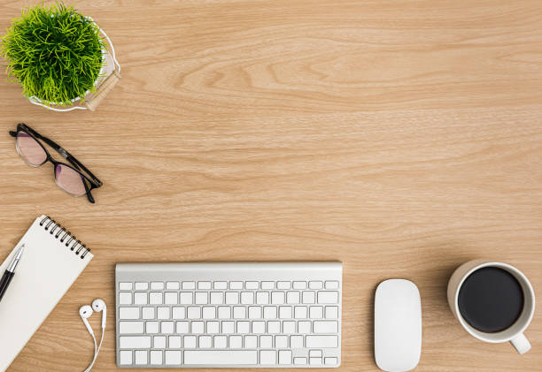 istock Top view Wood office desk table. Flat lay Workspace 1186626345