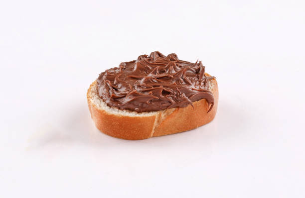 istock spread chocolate on toasted slice of baguette 1186632251