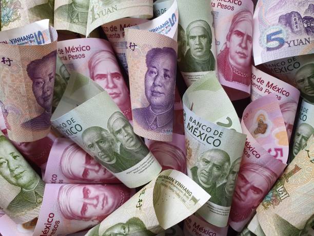 istock chinese banknotes and Mexican money 1186634837
