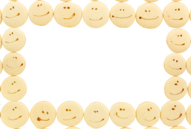 smile face on sponge drop cookie frame with copy space isolated on white background