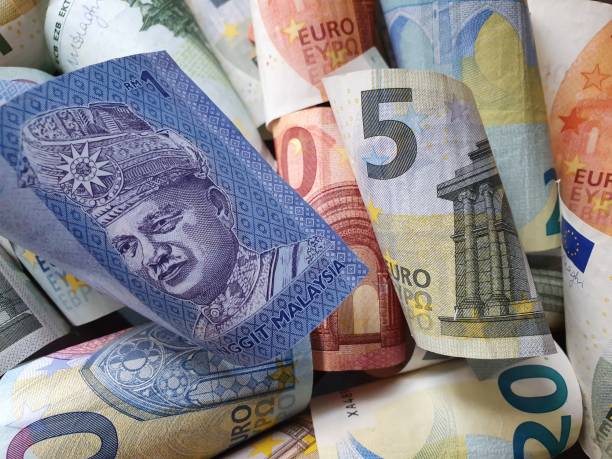 approach to Malaysian and European money background for business, economics and finance issues coins of ringgit of malaysia stock pictures, royalty-free photos & images