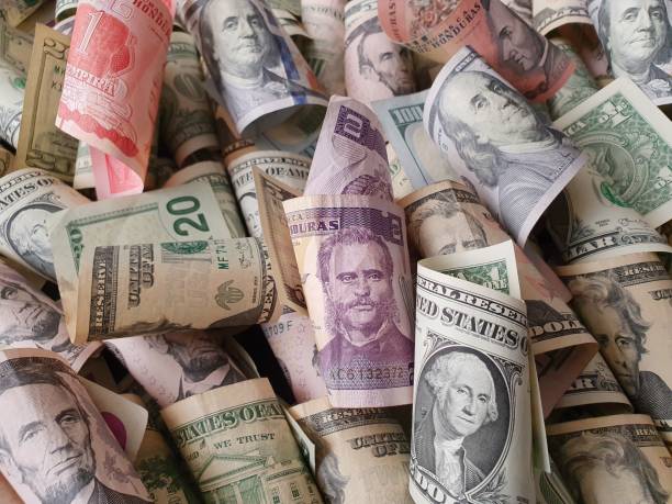 istock Honduran banknotes and American dollar money 1186635949