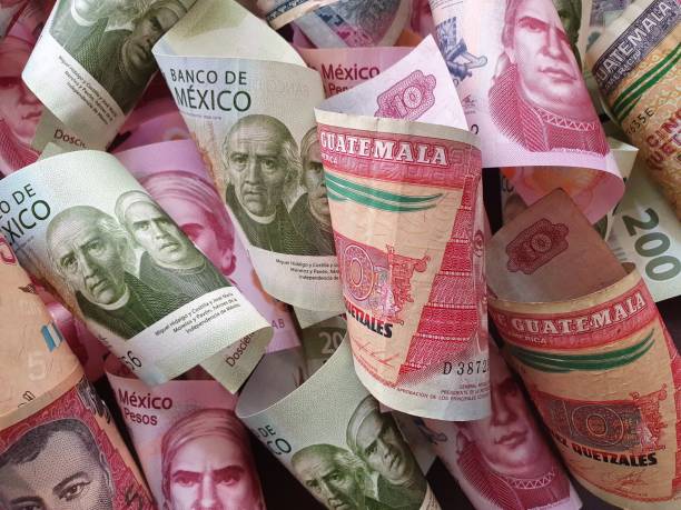 istock guatemalan banknotes and Mexican money 1186635976