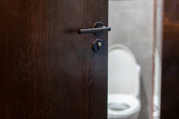 istock door to toilet 1186636024