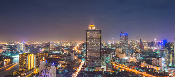 istock Panoramic view Cityscape business district from aerial view high building at dusk (siam silom central Bangkok, Thailand) 1186641008