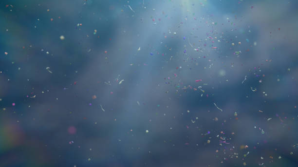 plastic pollution, micro nurdles in ocean water garbage swimming in sea water, contamination problem microplastic stock pictures, royalty-free photos & images