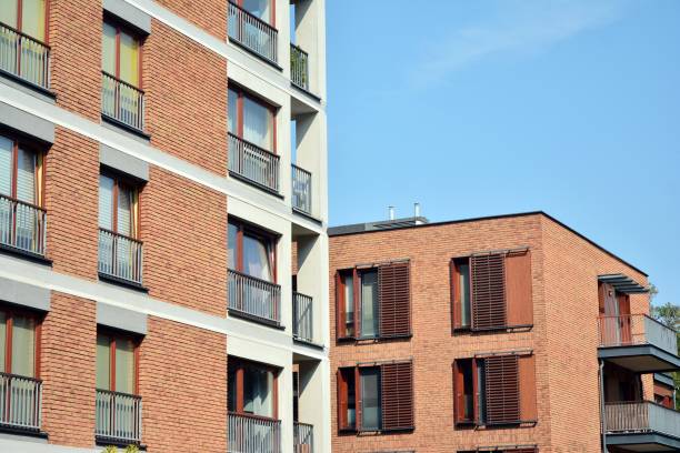 istock Modern apartment buildings on a sunny day with a blue sky. 1186648435