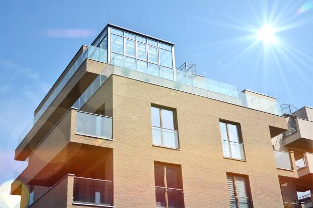 istock Modern apartment buildings on a sunny day with a blue sky. 1186651453