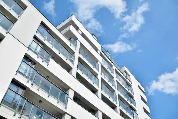 istock Modern apartment buildings on a sunny day with a blue sky. 1186651501