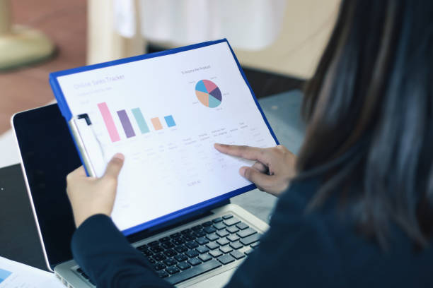 istock woman using laptop with Big Data, Storage Network Online Server Concept ,and icon. Digital concept. Internet on everyday. Global connecting concept. 1186654130
