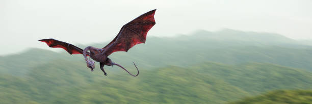 istock flying dragon, legendary creature above a forest landscape 1186661494