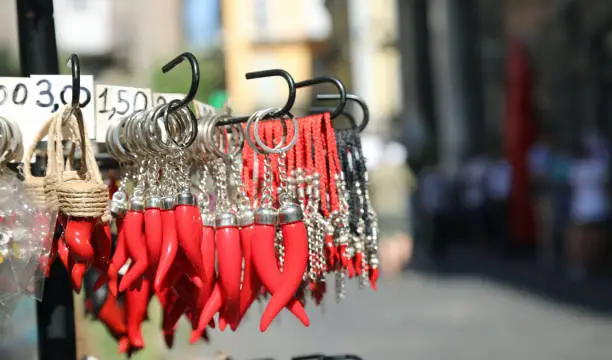 many red cornet as talisman for sale in the streeet stand in Naples in Italy
