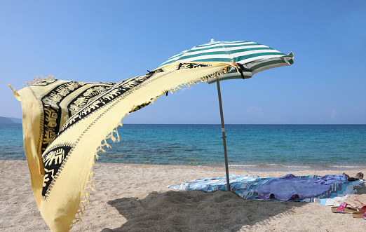sunshade on the beach on summer without poeple