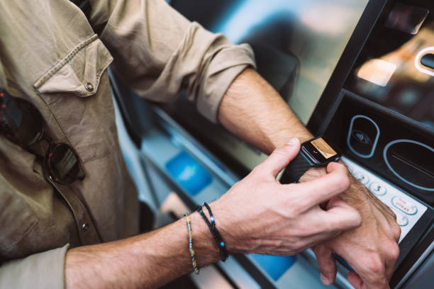 Man withdrawing money with smartwatch