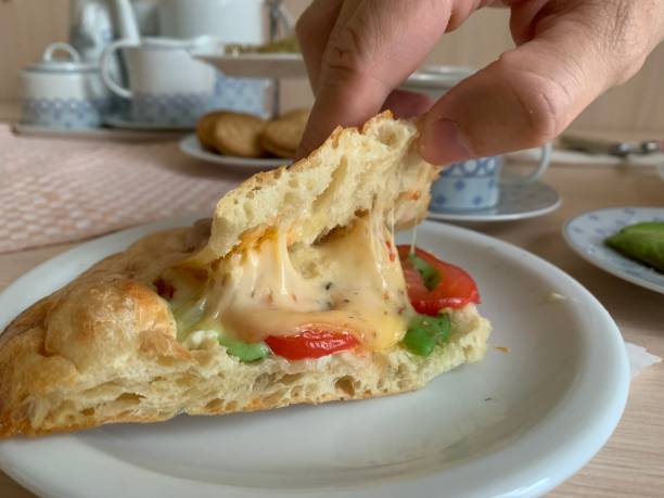 istock pita bread with cheese and tomato 1186667068