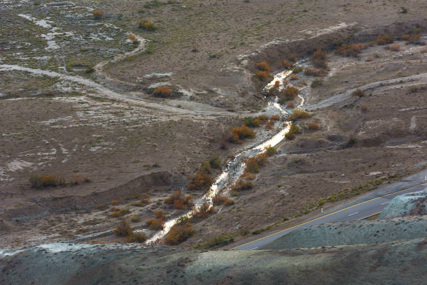 istock Small mountain river in the fall season 1186668623