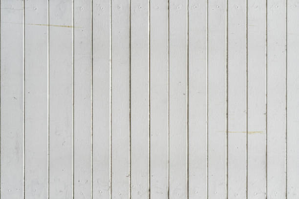 White natural wood wall texture and background. Old white wooden fence pattern wallpaper.