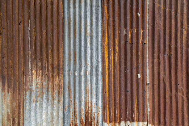 istock Rusted galvanized iron plate, red stain on old metal sheet wall texture. 1186669455