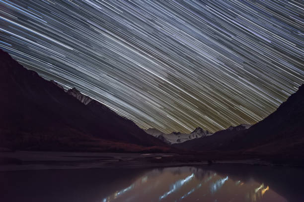 istock stars tracks mountains lake sky autumn 1186669767