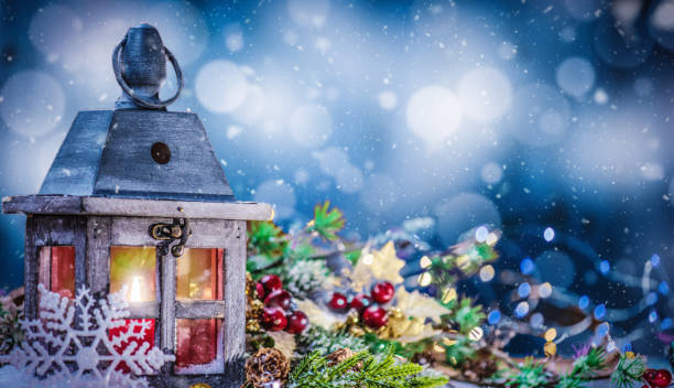 istock Lantern with Lit Candle and Christmas Decorations with Copy Space 1186671797