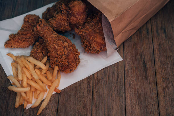 istock Fried chicken and French fries or chips (potato) 1186672372