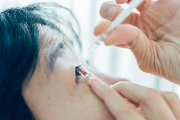 istock Woman use eye drop, artificial tears to the eye 1186673749