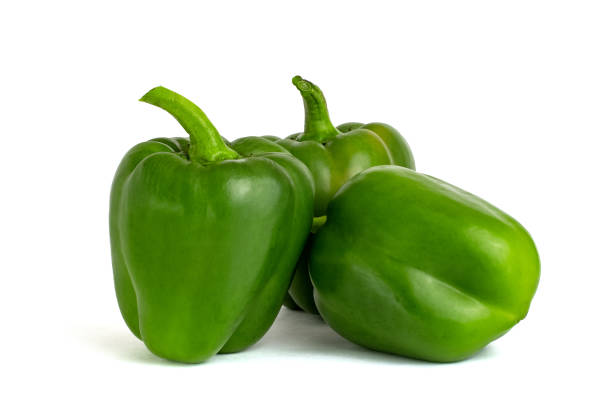 istock Three sweet bell peppers isolated on white background cutout 1186678433