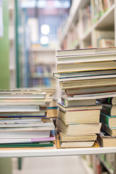 istock Books on Shelves in a Library 1186681586