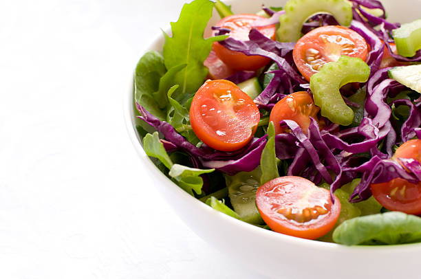 istock Mixed Green Salad in a white bowl 118668252