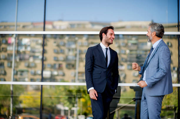 istock Two businessmen discussing about the new project 1186685466