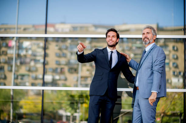 istock Two businessmen discussing about the new project 1186686472