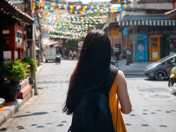 istock Asian woman with backpack holding map in the city, travel concept. 1186689708