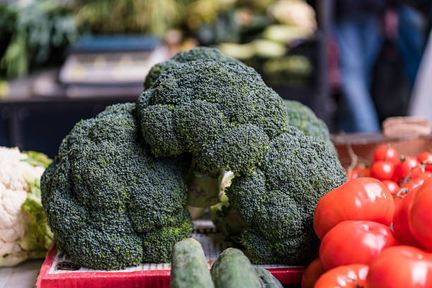 Close-up View at the Fresh and Delicious Organic Broccoli at the Farmers Market.