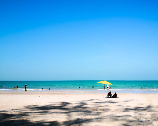 istock many people happy on the tropical beach in Thailand. 1186694271