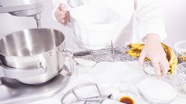 istock Mixing ingredients to bake banana nut bread. 1186694689
