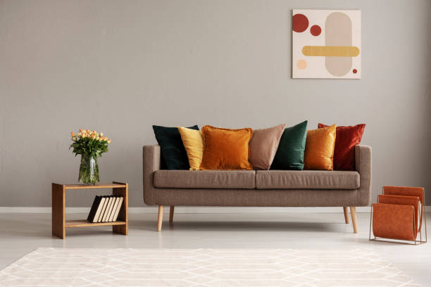 istock Vintage style grey living room interior with trendy sofa 1186695263