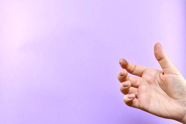 istock Hand, empty, without anything as if holding, a mobile phone or something flat. 1186697005