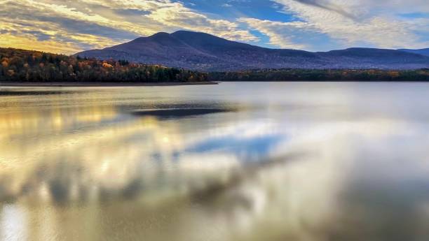 Brilliant autumn over a calm mountain lake