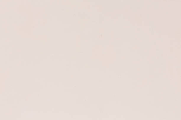 istock Watercolor beige paper background, pattern, texture close-up. 1186698432