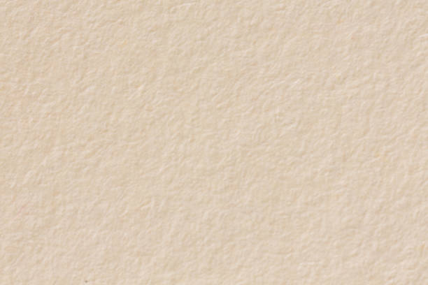 istock Background of brown, light beige paper texture, macro shot. 1186698434